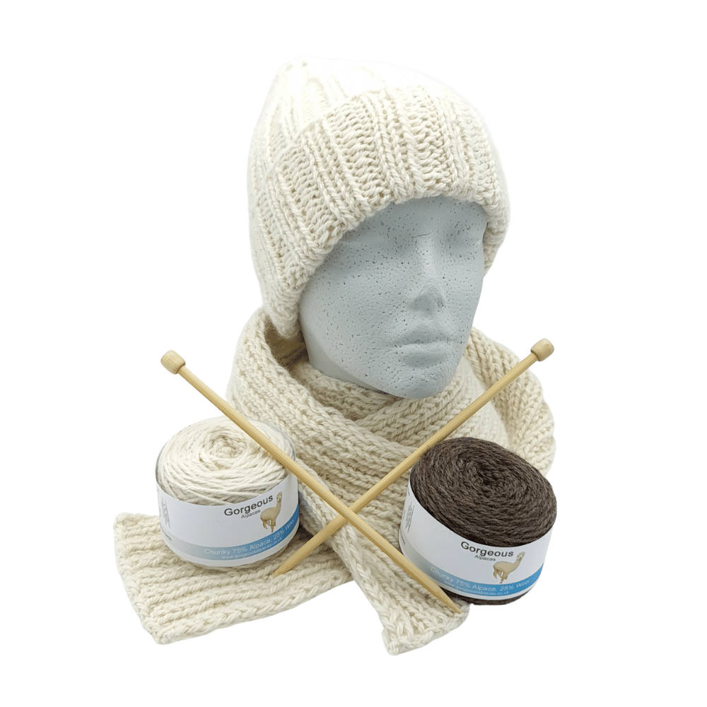 This chunky alpaca wool hat and scarf knitting kit uses alpaca yarn from British and Irish farms. You can knit it in the round on circular needles or as a flat panel with single pointed needles.