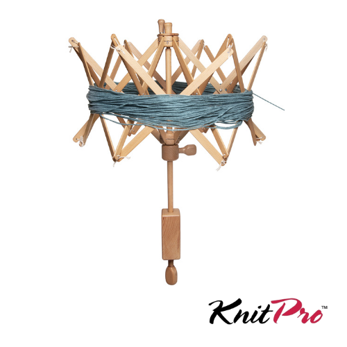 Wooden swift skein holder with yarn, branded 'KnitPro', on a white background