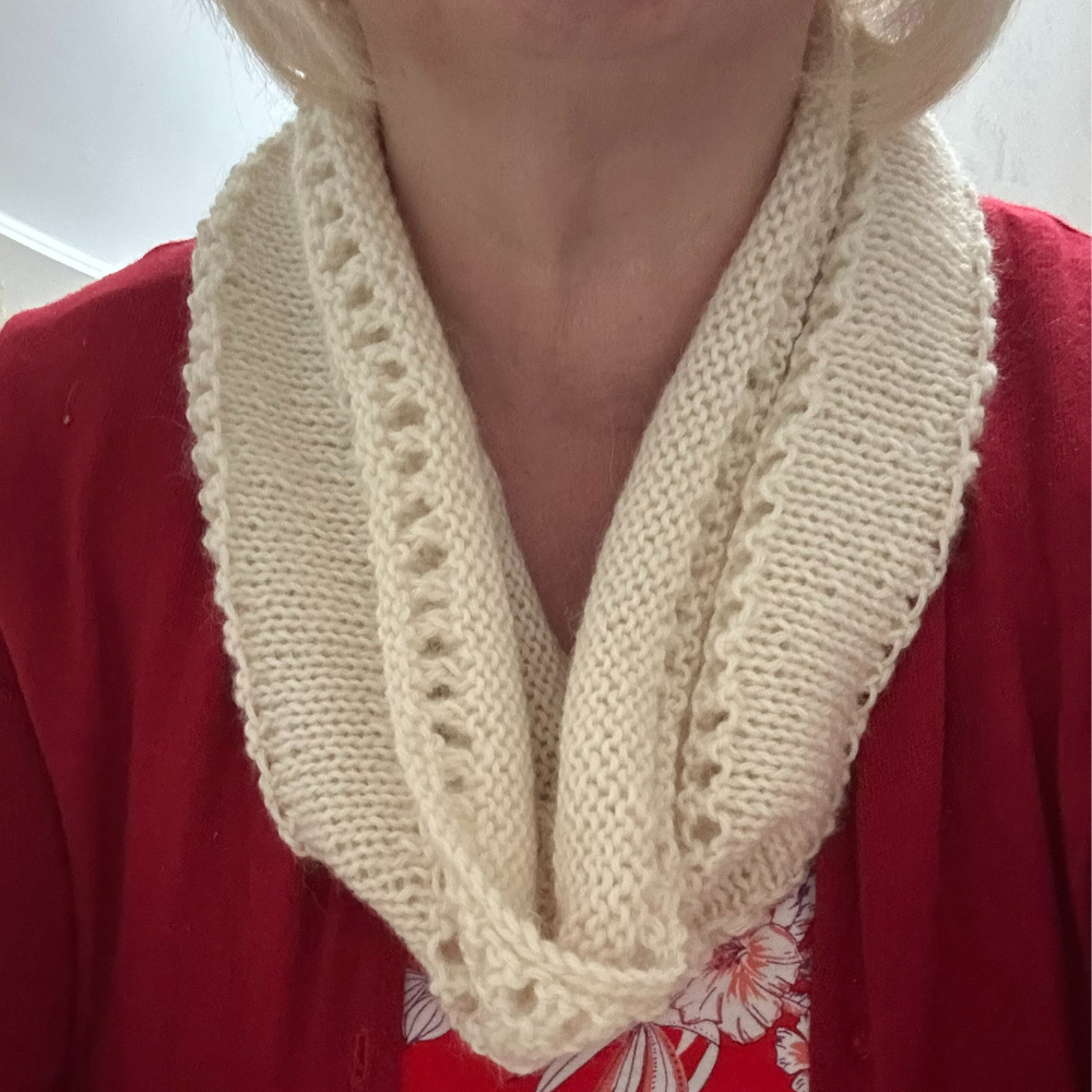Restful Eyelet Cowl in Model in alpaca DK Parchment