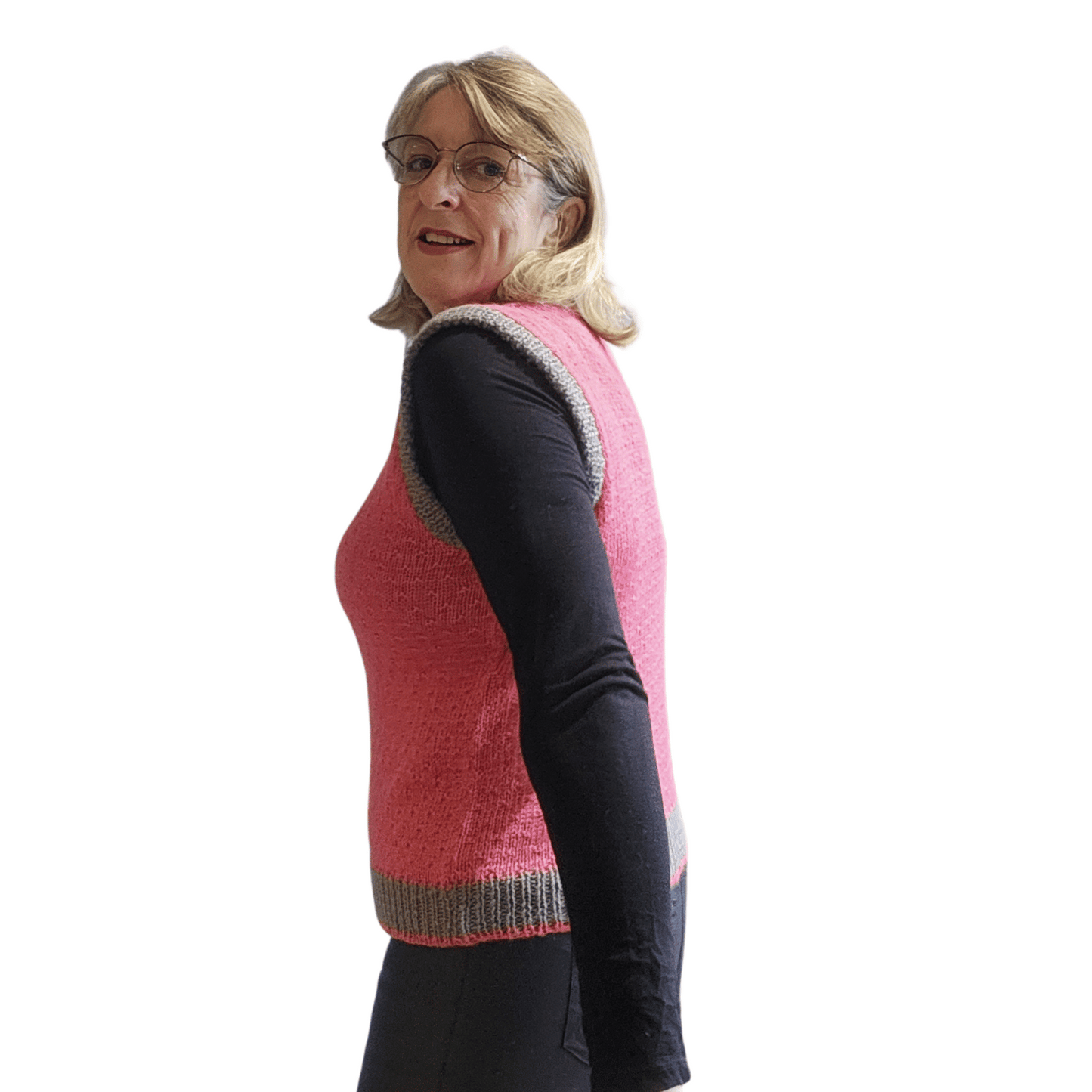 Knitting kit for this sleeveless sweater with a simple pattern detail, using Gorgeous Alpacas alpaca wool - this example in Rose Pink and Grey