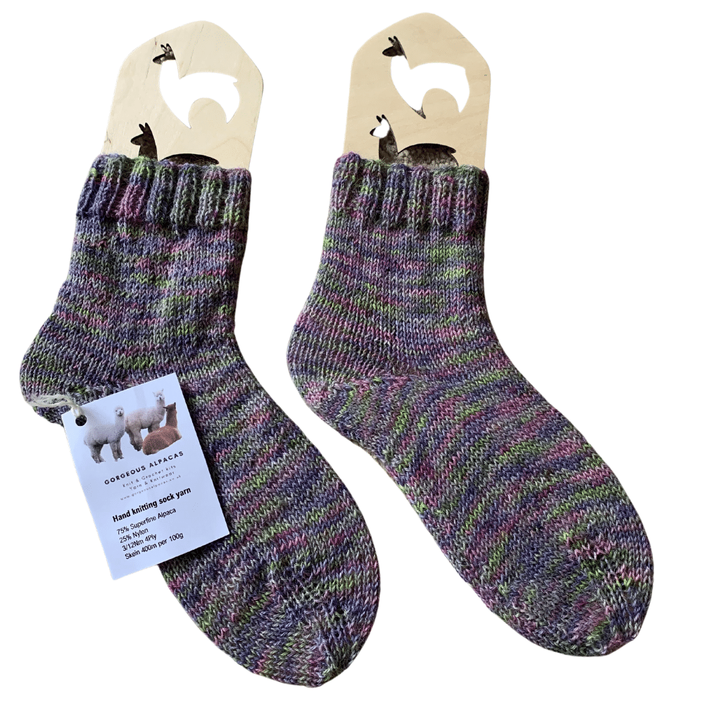 4-ply alpaca sock wool from British and Irish farms shown here on sock blockers