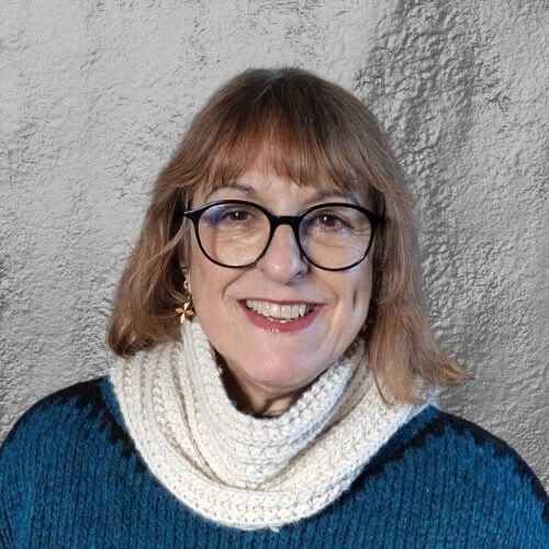 Emma wearing Everyday cowl in Chunky alpaca wool shown here in parchment