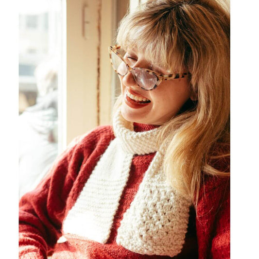Chunky alpaca knitting kit – Cosy Sampler Scarf shown on model in Parchment British & Irish alpaca yarn by Gorgeous Alpacas.