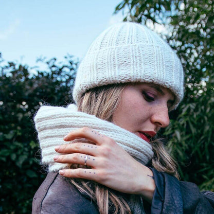 Model wearing chunky alpaca Seaman's hat and scarf knitted from Gorgeous Alpacas pattern – shown in Parchment.