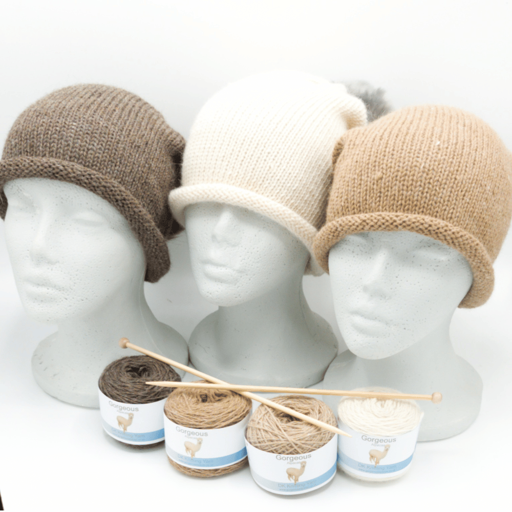 Alpaca wool knitting kit hat shown here in speckledy grey, parchment, and sandstone