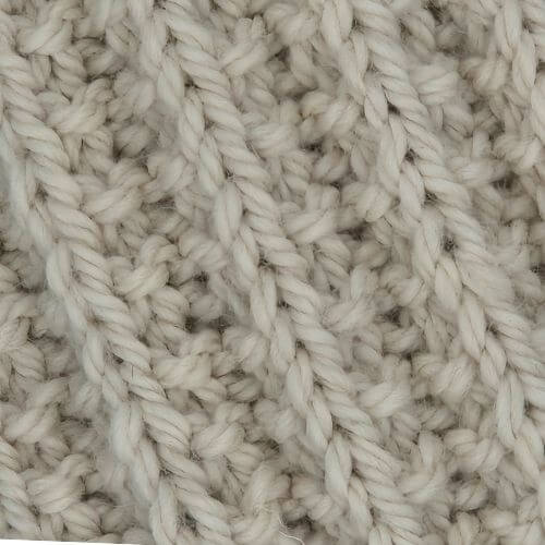 Close up of the stitch used in the Everyday Gorgeous Alpaca scarf and cowl, in alpaca wool shown here in parchment