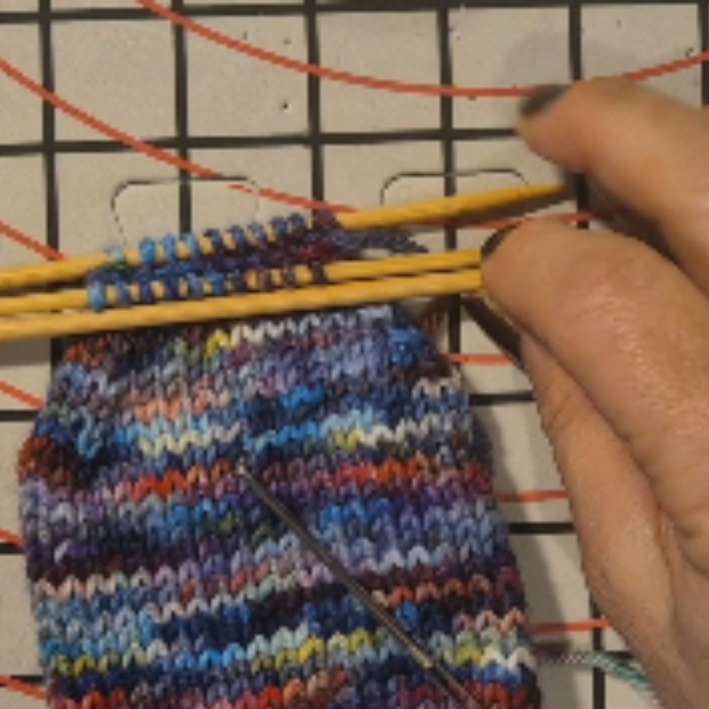Load video: Instructions on how to do kitchener stitch using a tapestry needle