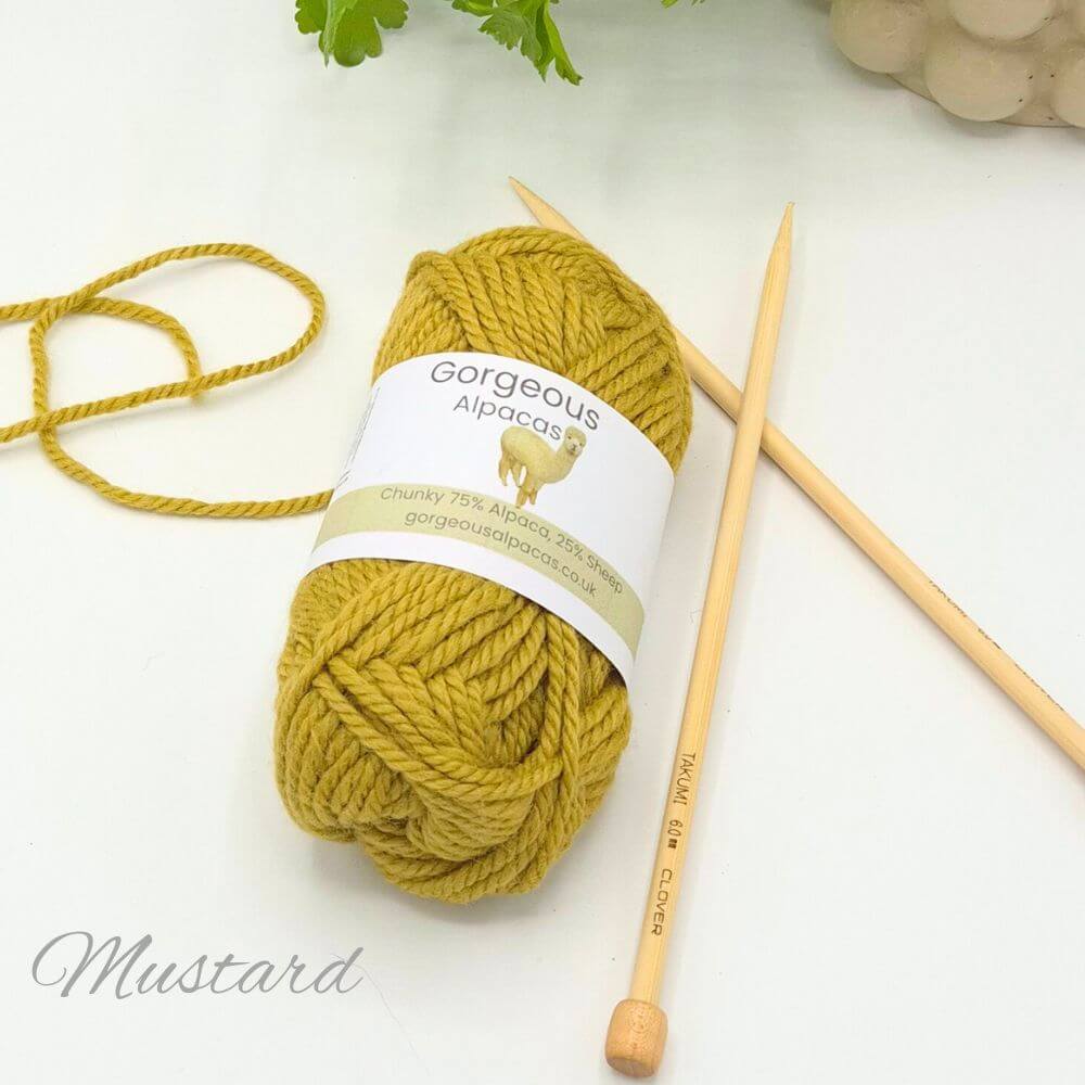 Chunky alpaca yarn from British & Irish alpaca farms shown here in Mustard.