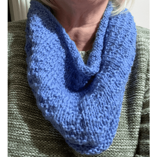 Alpaca wool knitting kit shown here in Sky Blue and modelled by Michelle