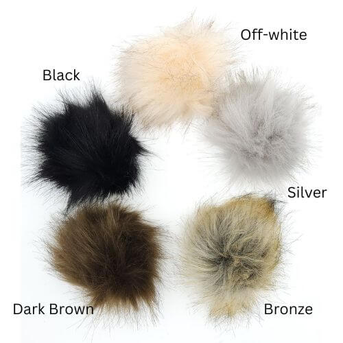Six faux fur pom-poms in different colors arranged in a circle on a white background, labeled with text: Black, Off-white, Silver, Bronze, and Dark Brown.