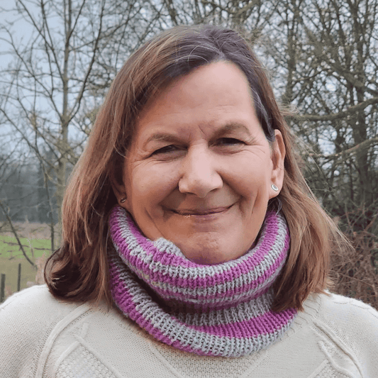Alpaca wool knitting kit for the family ribbed striped cowl shown here in lilac and lunar grey, worn here by Lucinda