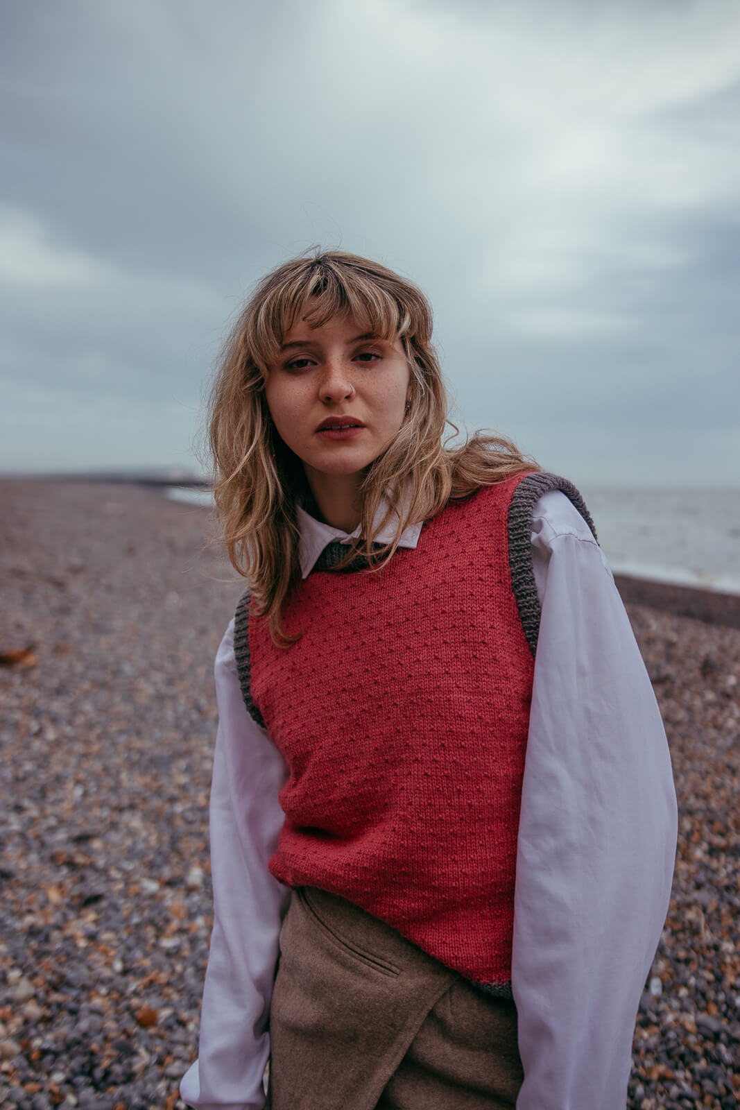 Knitting kit for this sleeveless sweater with a simple pattern detail, using Gorgeous Alpacas alpaca wool - this example in Rose Pink and Grey